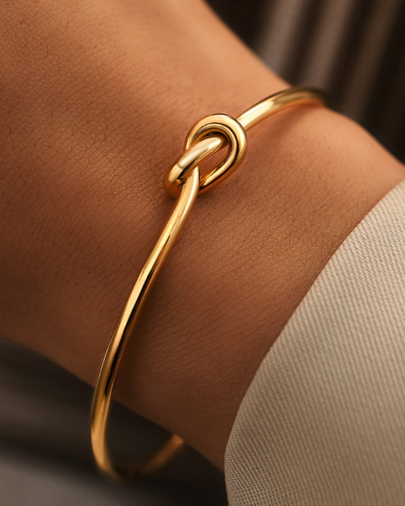 Flōre | Eternity Knot Bracelet – Luxury Designer Bangle & Slimming Minimalist Wrist Cuff