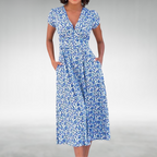 Flowing A-Line Midi Dress with Defined Waist and Delicate Floral Pattern Blue