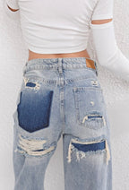 Women's Vintage Ripped Jeans with Unique Patchwork Detail