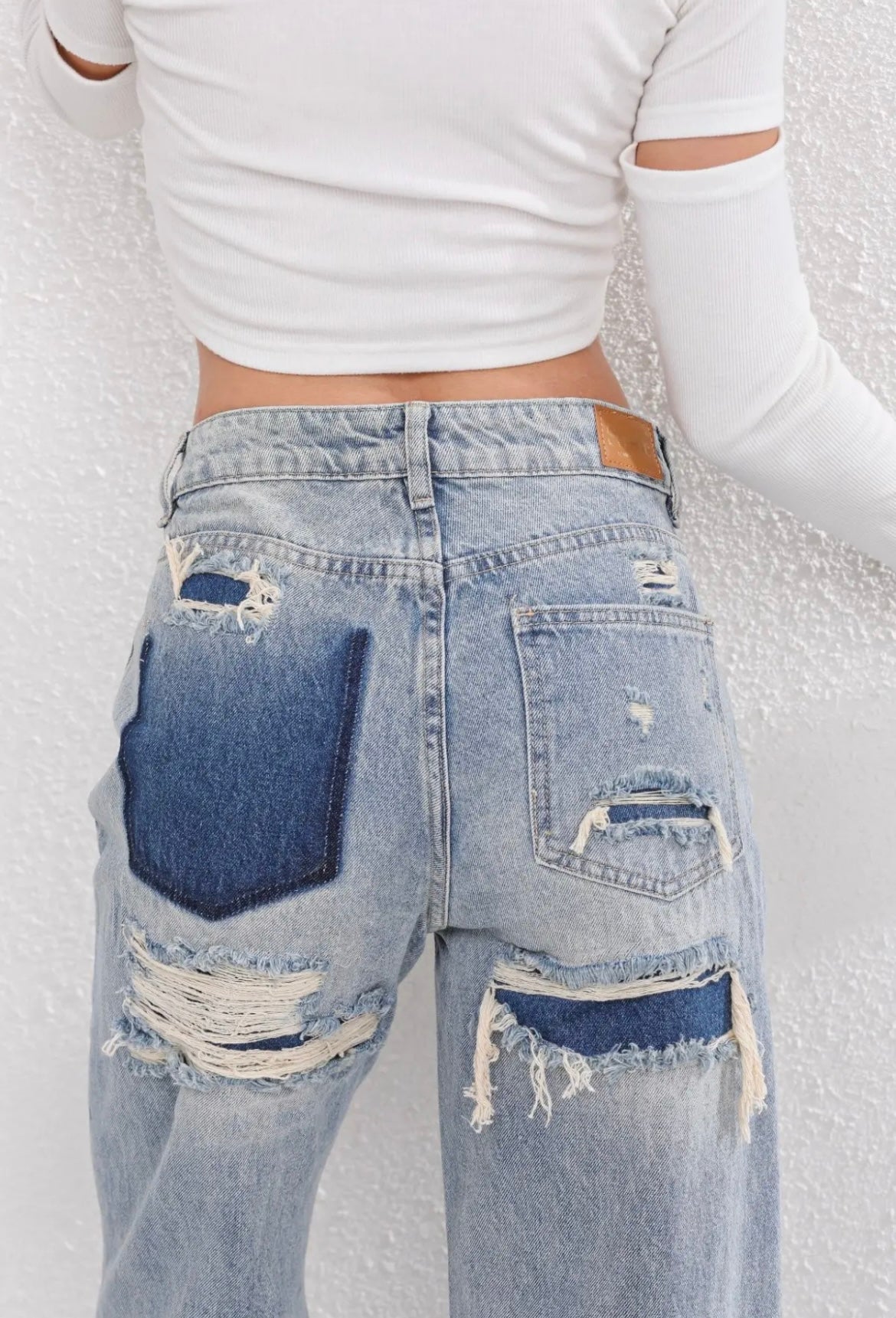 Women's Vintage Ripped Jeans with Unique Patchwork Detail